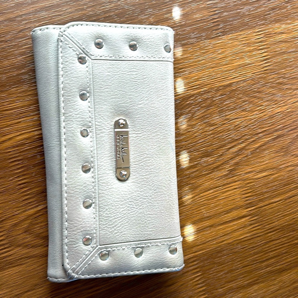 Nicole Miller wallet , 7 x 4 inches. Soft brown: khaki colored